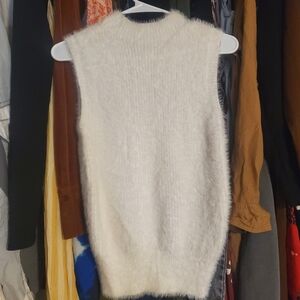 Elegant Sleeveless Cream Turtleneck Sweater